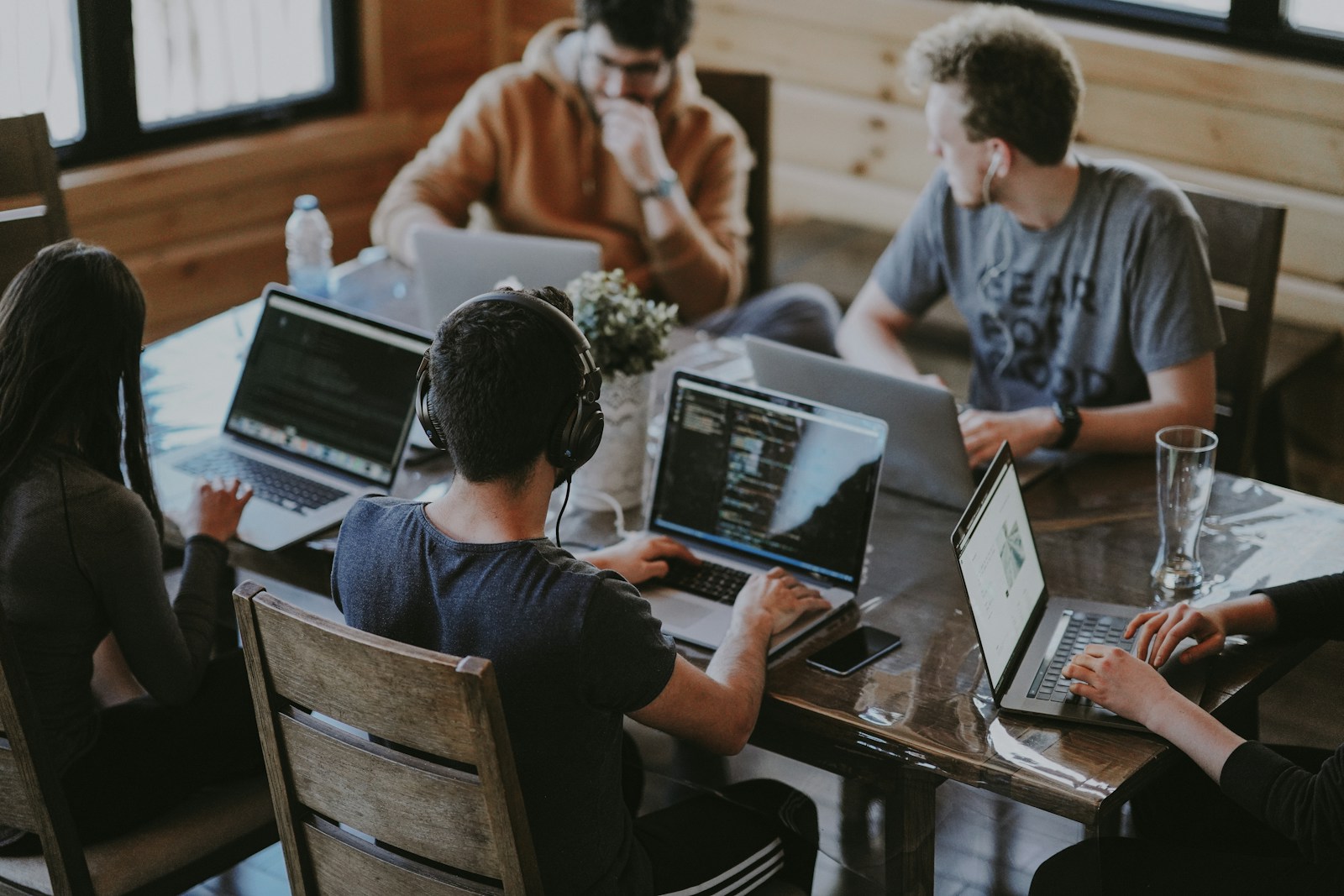 ShieldWith AI team sync discussing client FAQ topics at Vancouver studio